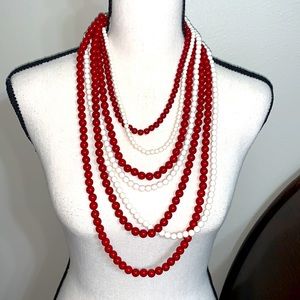 Red and white layered bead necklace